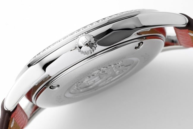 top-tier replica Hermès Slim d’Hermes women’s white dial red band quartz watch side view
