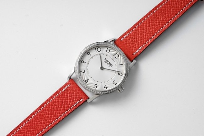 top-tier replica Hermès Slim d’Hermes women’s white dial red band quartz watch front view