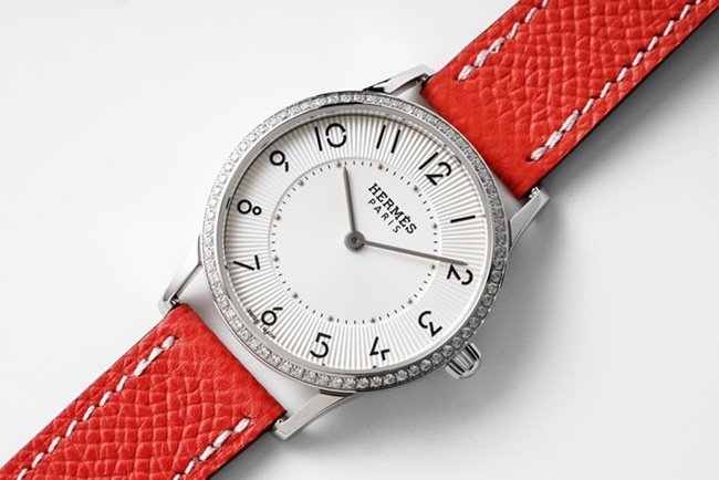 top-tier replica Hermès Slim d’Hermes women’s white dial red band quartz watch front view
