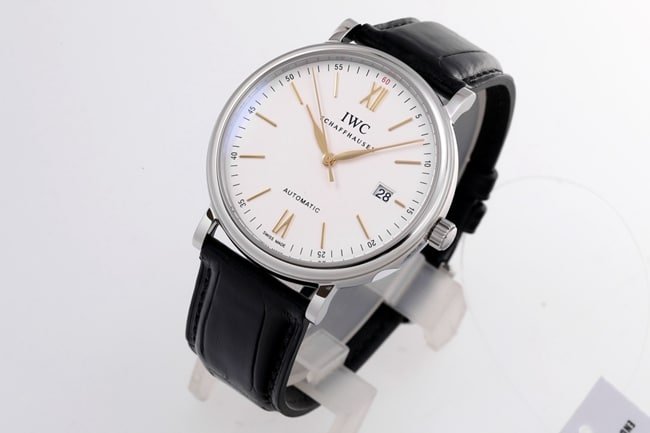 V7 factory IWC top-tier replicahigh-quality replica watch men's white dial black belt wave Fino series disc automatic movementleather strap watch front view