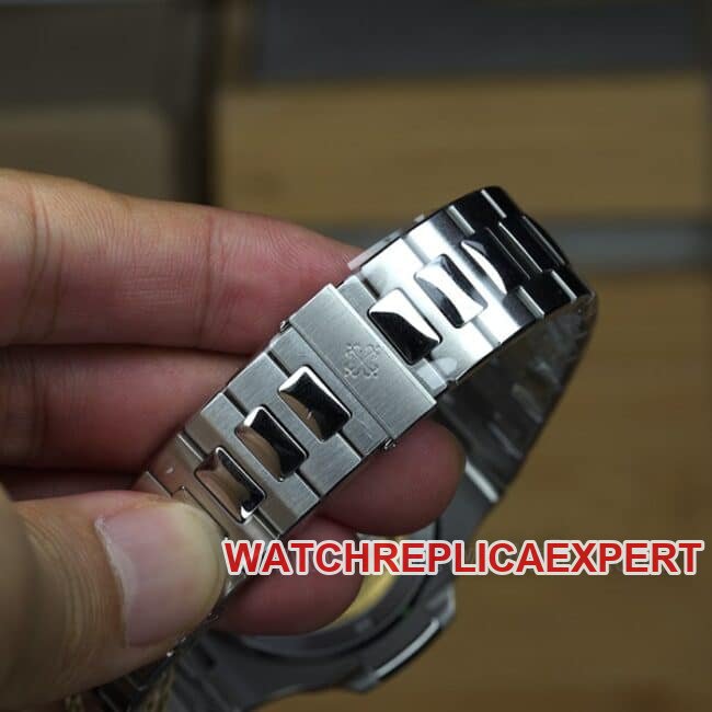 PPF Factorytop-tier replica watch Patek PhilippeNautilus men's blue dialsteel bracelet sport elegant fully automatic movement watch front view clasp picture